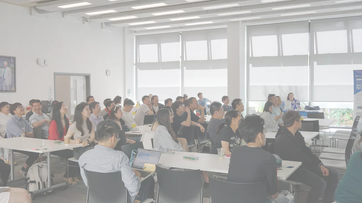 Researchers gathered for a Cambridge Chem&Bio seminar
